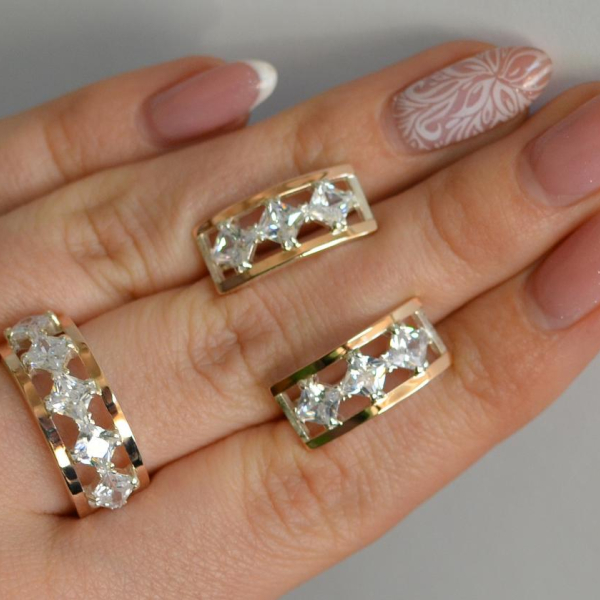 Срібний набір з золотими пластинами