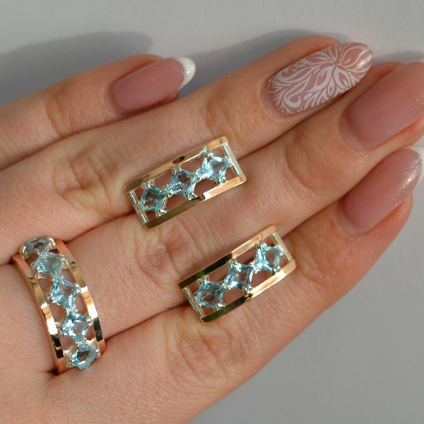 Срібний набір з золотими пластинами