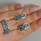 Срібний набір з золотими пластинами