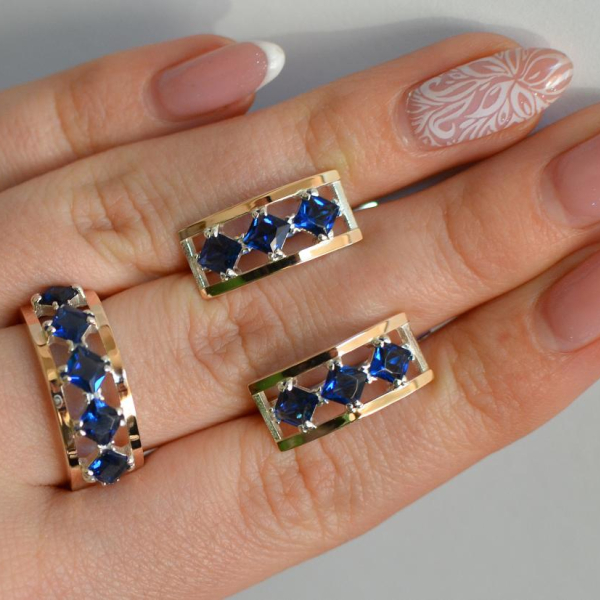 Срібний набір з золотими пластинами