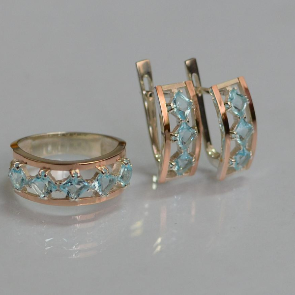 Срібний набір з золотими пластинами