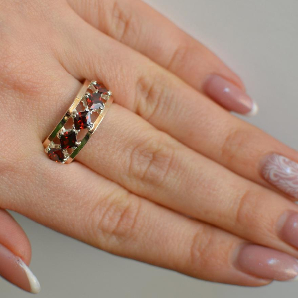 Срібна каблучка з золотими вставками