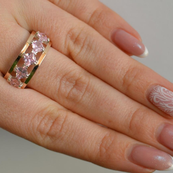 Срібна каблучка з золотими вставками