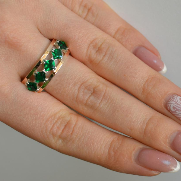 Срібна каблучка з золотими вставками