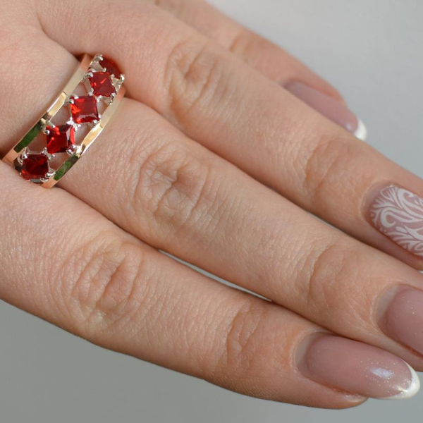 Срібна каблучка з золотими вставками