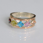 Срібна каблучка з золотими вставками