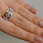 Срібна каблучка з золотими вставками