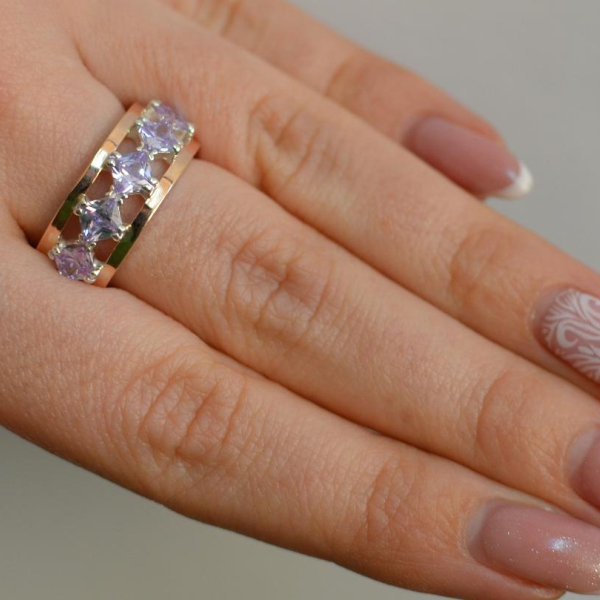 Срібна каблучка з золотими вставками