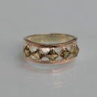 Срібна каблучка з золотими вставками