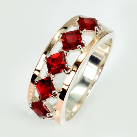 Срібна каблучка з золотими вставками