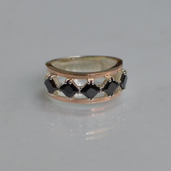 Срібна каблучка з золотими вставками