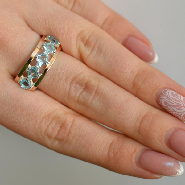 Срібна каблучка з золотими вставками