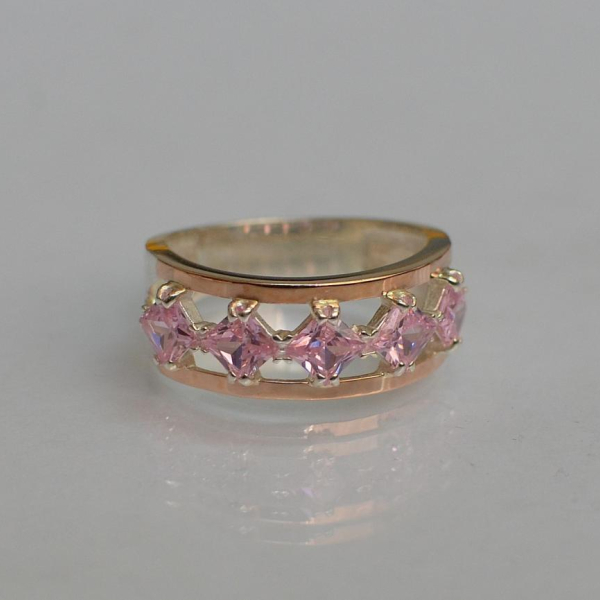 Срібна каблучка з золотими вставками