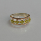 Срібна каблучка з золотими вставками