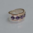 Срібна каблучка з золотими вставками