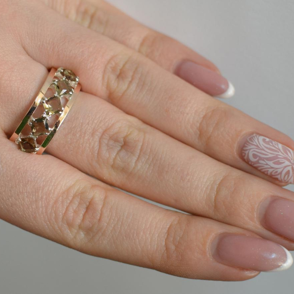 Срібна каблучка з золотими вставками