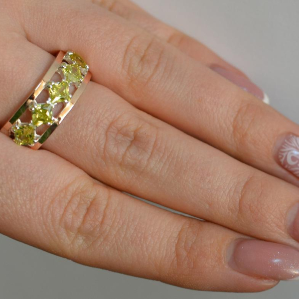 Срібна каблучка з золотими вставками