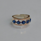 Срібна каблучка з золотими вставками