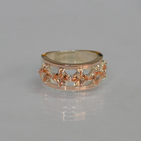 Срібна каблучка з золотими вставками