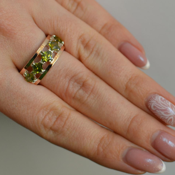 Срібна каблучка з золотими вставками