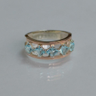 Срібна каблучка з золотими вставками