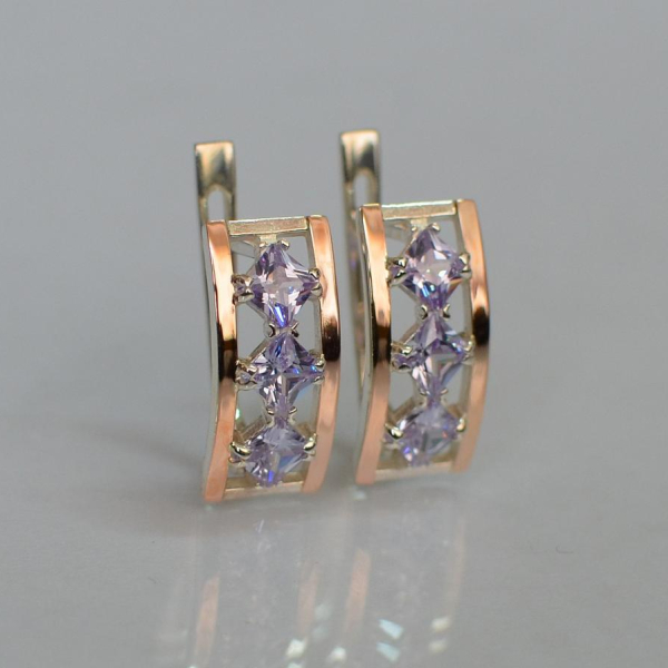 Срібні сережки з золотими вставками