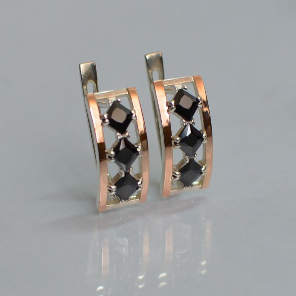 Срібні сережки з золотими вставками