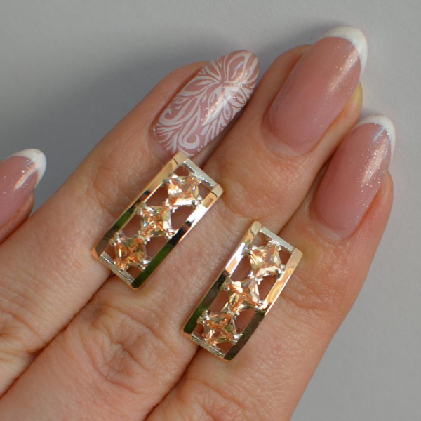 Срібні сережки з золотими вставками