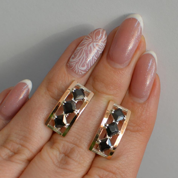 Срібні сережки з золотими вставками