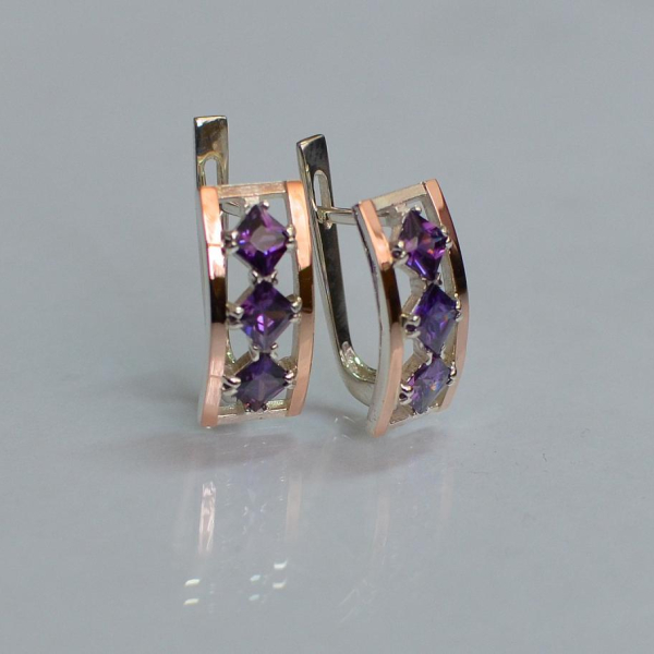 Срібні сережки з золотими вставками