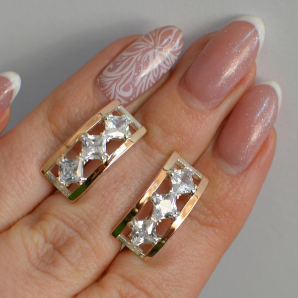 Срібні сережки з золотими вставками