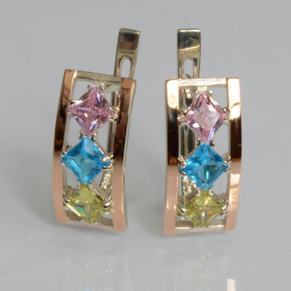 Срібні сережки з золотими вставками