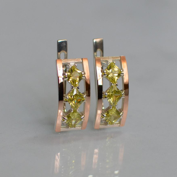 Срібні сережки з золотими вставками