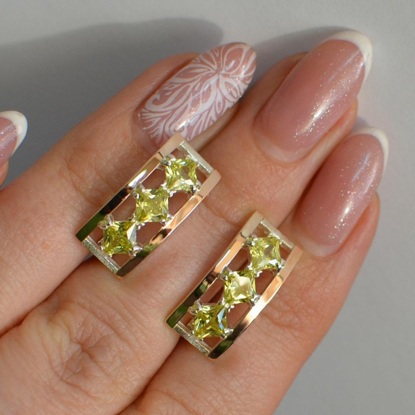 Срібні сережки з золотими вставками