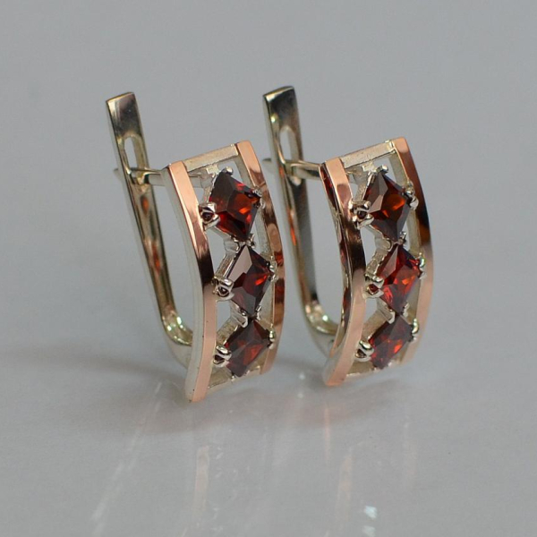 Срібні сережки з золотими вставками