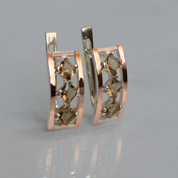 Срібні сережки з золотими вставками