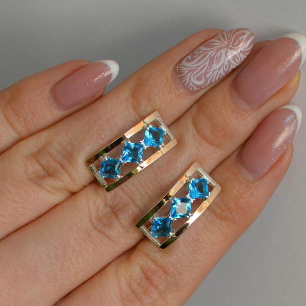 Срібні сережки з золотими вставками