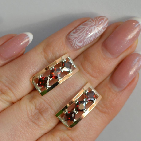 Срібні сережки з золотими вставками