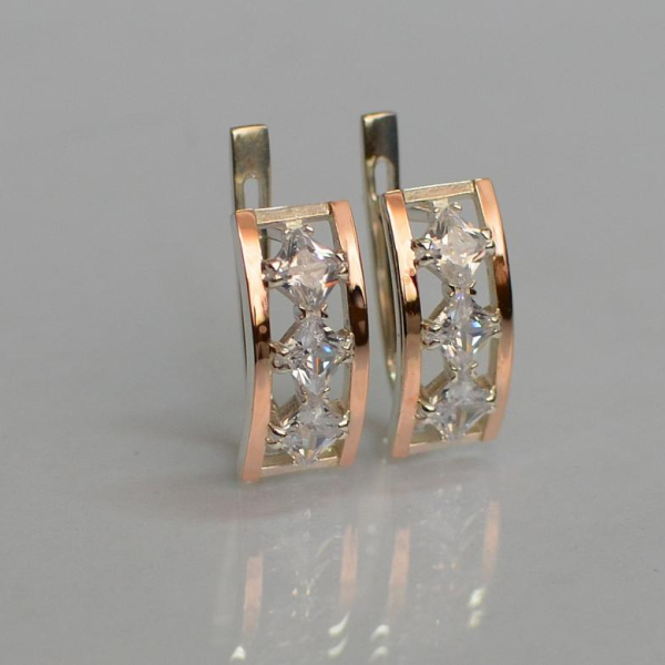 Срібні сережки з золотими вставками