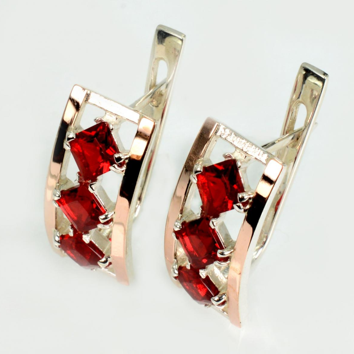 Срібні сережки з золотими вставками