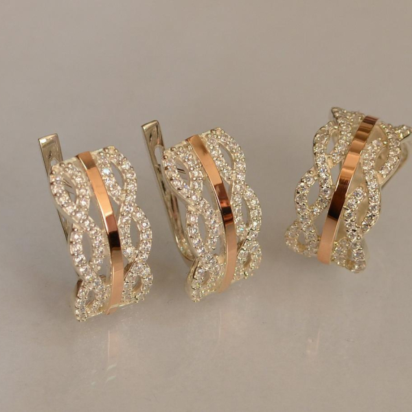 Срібний набір з золотими пластинами