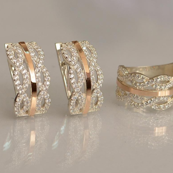 Срібний набір з золотими пластинами