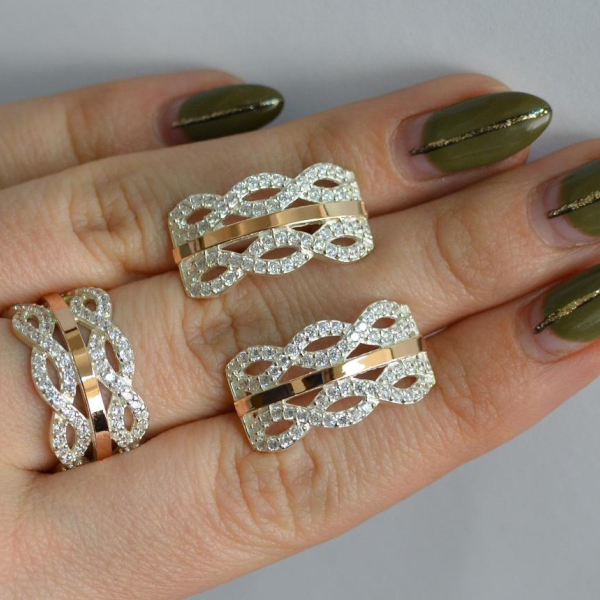 Срібний набір з золотими пластинами