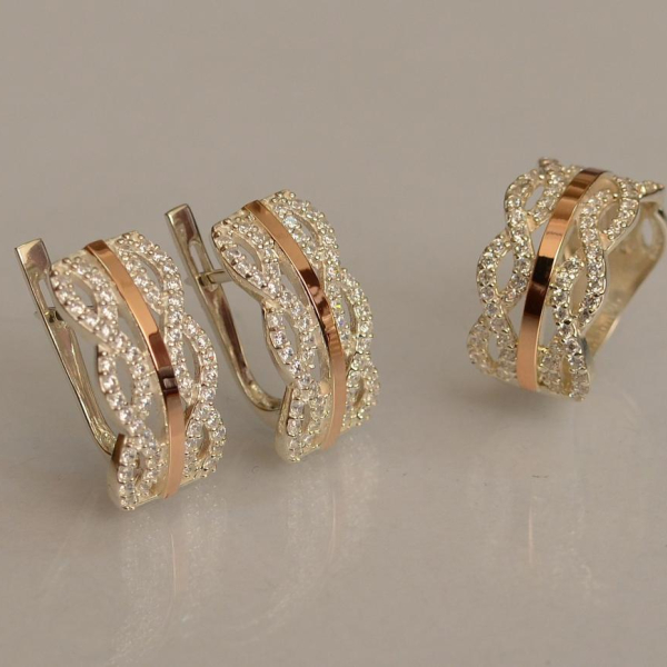 Срібний набір з золотими пластинами