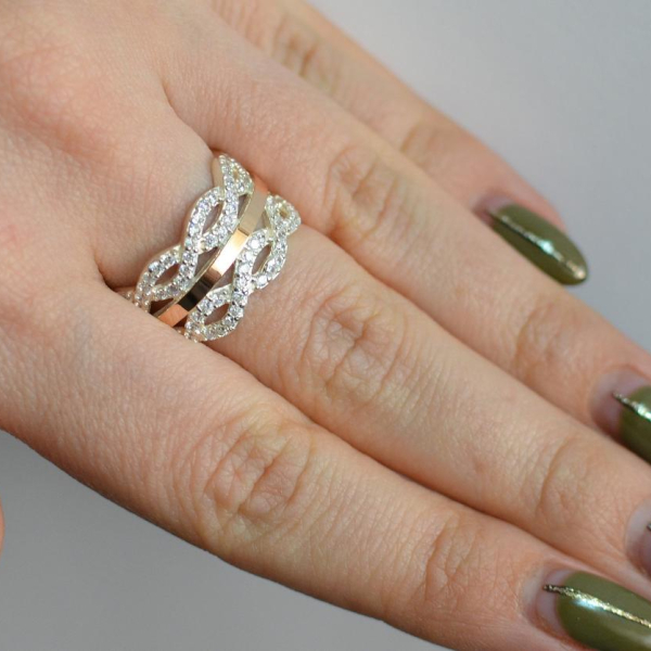 Срібна каблучка з золотими вставками