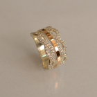 Срібна каблучка з золотими вставками