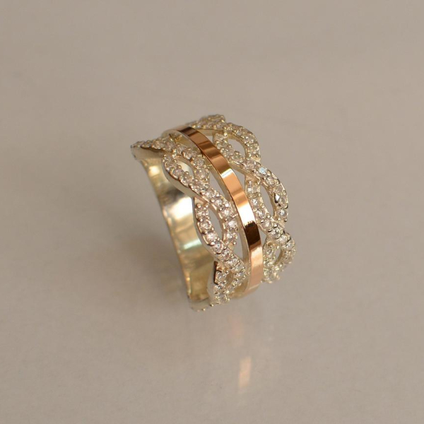 Срібна каблучка з золотими вставками