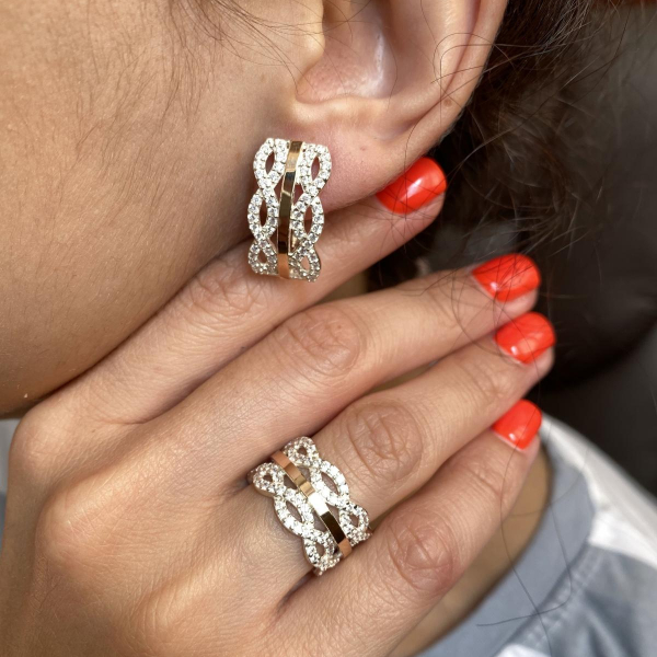 Срібна каблучка з золотими вставками