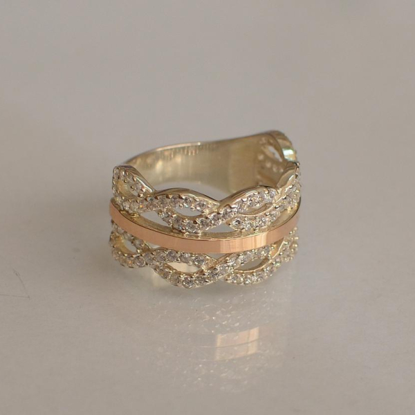 Срібна каблучка з золотими вставками