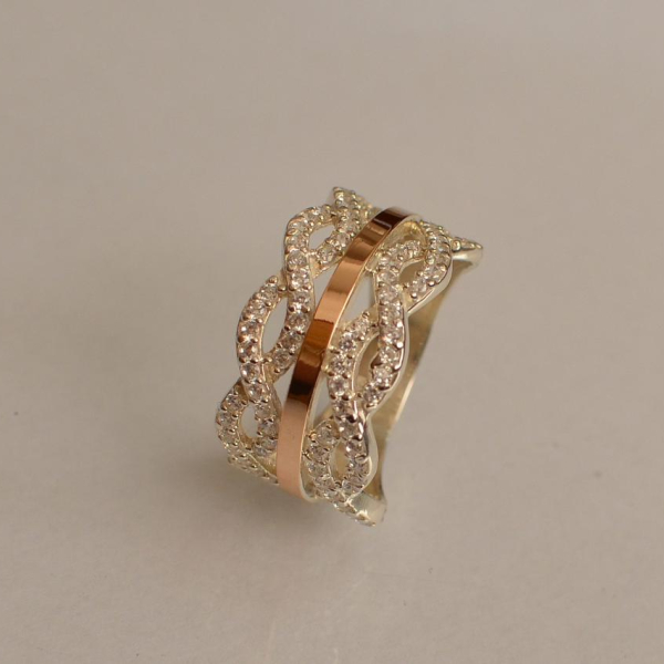 Срібна каблучка з золотими вставками